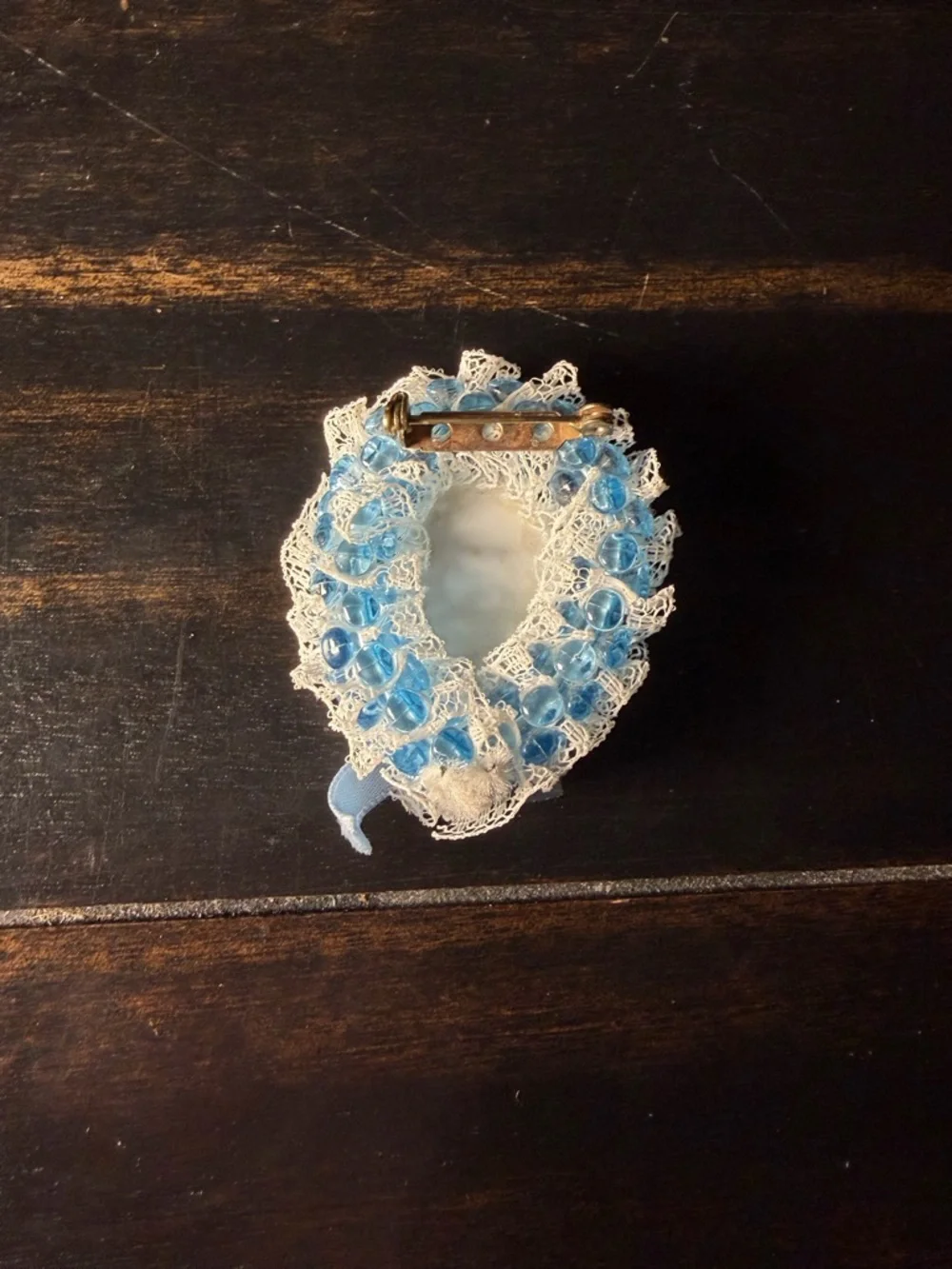 Vintage blue and white cameo brooch